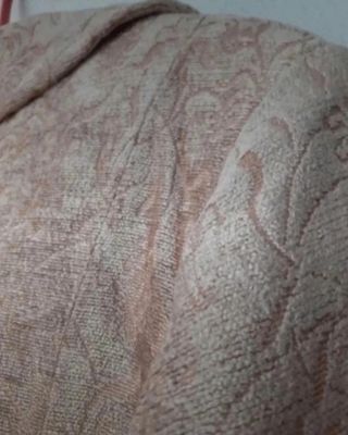 Giubbotto beige con rilievo