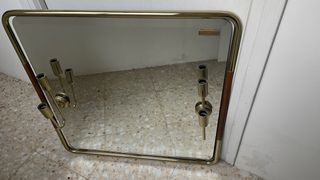 Espejo de pared con candelabros