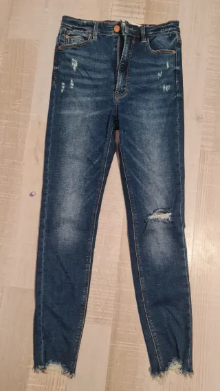 Pantalón vaquero mujer desgastado