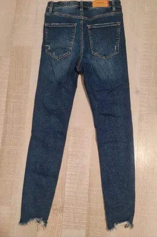 Pantalón vaquero mujer desgastado