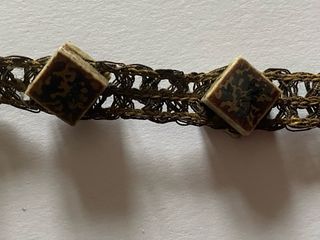 Rosário de parede âmbar