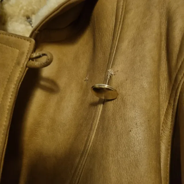 Montone in pelle scamosciata con pelliccia