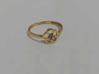Anillo oro 18k flor con circonitas