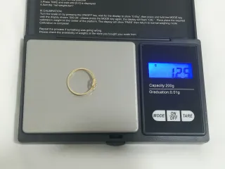 Anillo oro 18k flor con circonitas