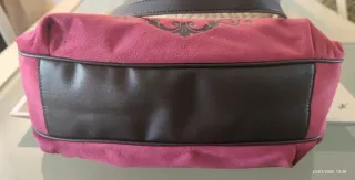 Bolso de hombro fucsia y marrón