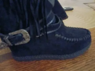 Botas negras con flecos