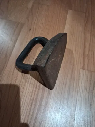 Plancha antigua de hierro fundido