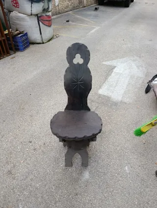 Silla antigua de madera plegable