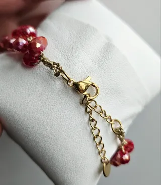 Bracciale con perle rosse e oro
