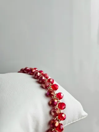 Bracciale con perle rosse e oro