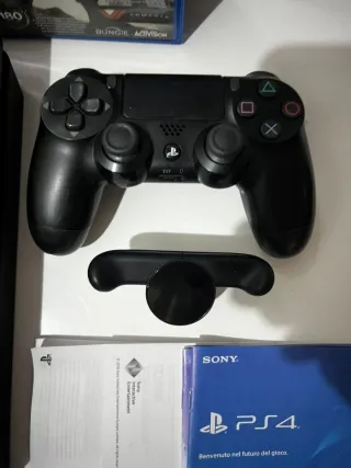 Bundle console ps4 slim 500gb + giochi, scatola