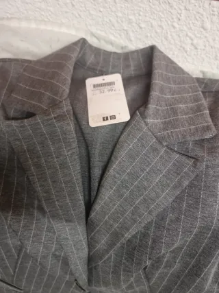 Traje sastre chaqueta y pantalón gris mujer