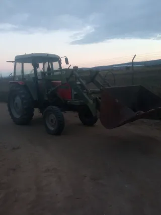 Pala tractor 4 botellas doble efecto