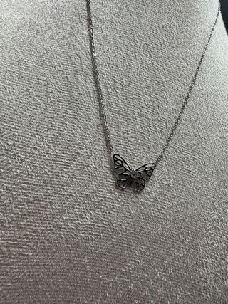 Collar de acero con mariposa