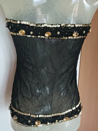 Top nero velato con paillettes dorate