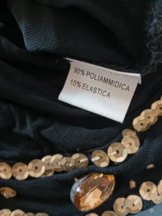 Top nero velato con paillettes dorate