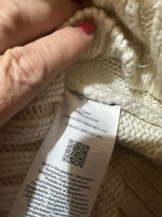 Maglione bianco con trecce