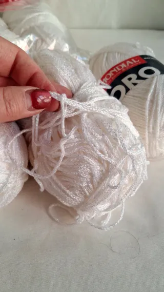 8 gomitoli Mondial Oro bianco, argento