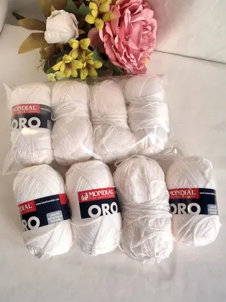 8 gomitoli Mondial Oro bianco, argento