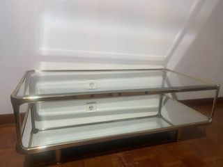 Mesa baja cristal, espejo y metal dorado.