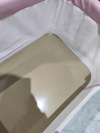 Minicuna rosa casi nueva