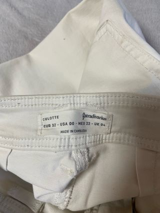 Pantalones blancos con rotos