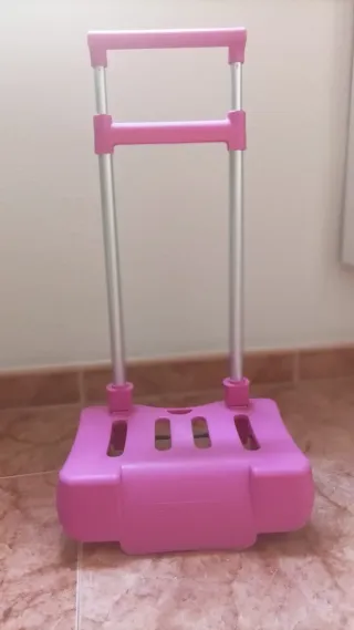 Porta mochila rosa con ruedas