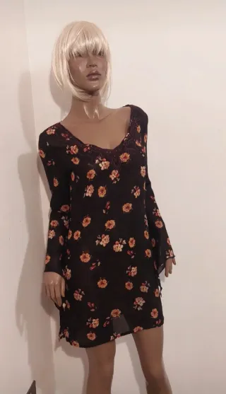 Blusa lunga floreale nera