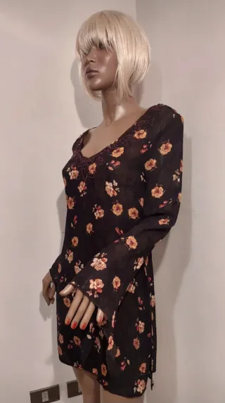 Blusa lunga floreale nera