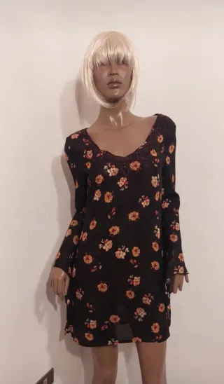 Blusa lunga floreale nera