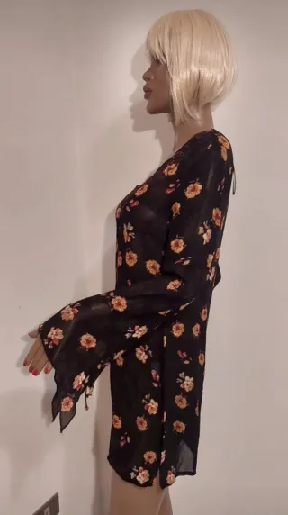 Blusa lunga floreale nera