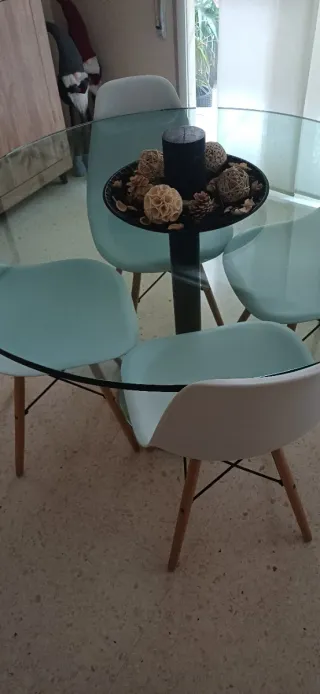 Mesa de comedor redonda de cristal