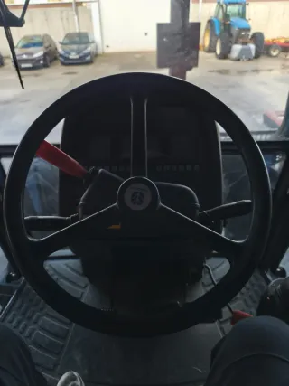 Tractor New Holland TM115 con tripuntal