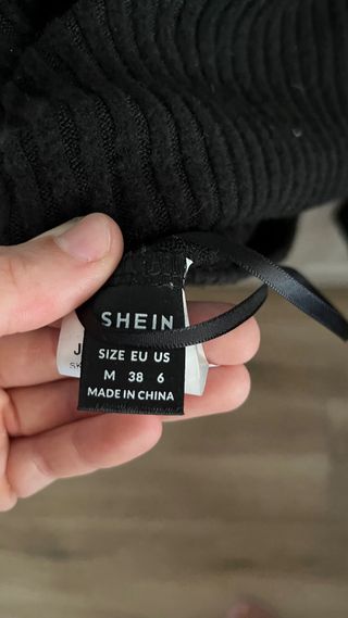 Top negro palabra de honor mangas acampanadas