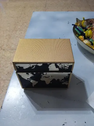 Mechero de mesa dorado mapa mundi