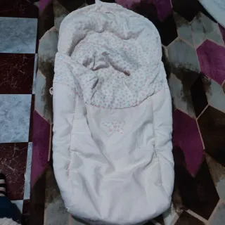 Chichonera y saco de bebé niña