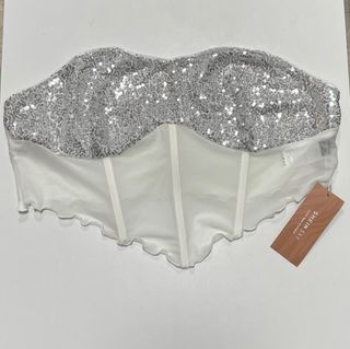 Top corsé blanco con lentejuelas