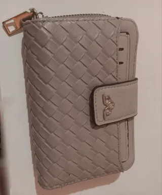 Monedero tejido gris