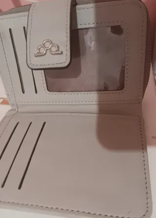 Monedero tejido gris