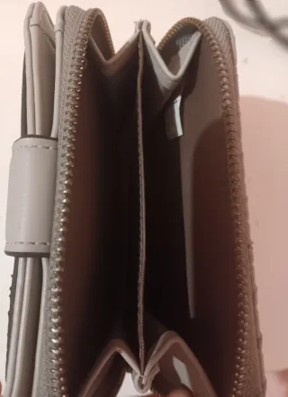 Monedero tejido gris