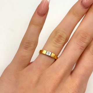 Anillo de oro 18kt con diamante