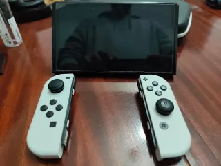 Nintendo Switch OLED Blanca + Monster Hunter Rise