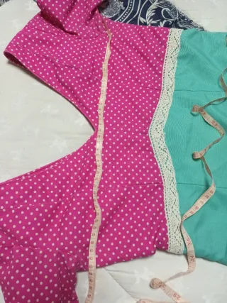 Traje de flamenca o sevillana rosa y turquesa