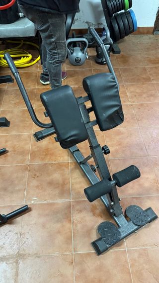 Equipo de gimnasio: pesas y barra