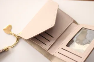 Cartera mujer con corazón y borla