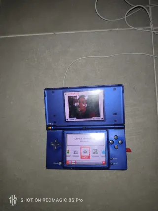 Nintendo DSi Azul con cargador y funda