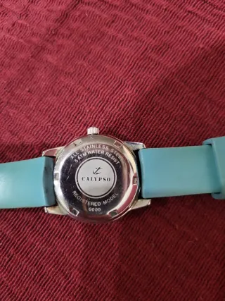 Reloj infantil analógico con perros