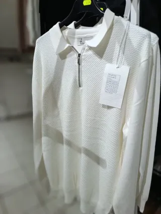 Polo . con zip taglia S/M/L