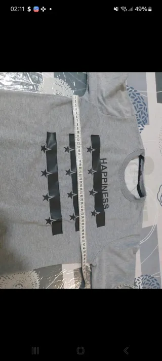 Maglia grigia con stampa donna