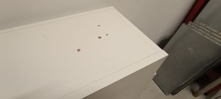 Arcón zapatero blanco bajo escritorio